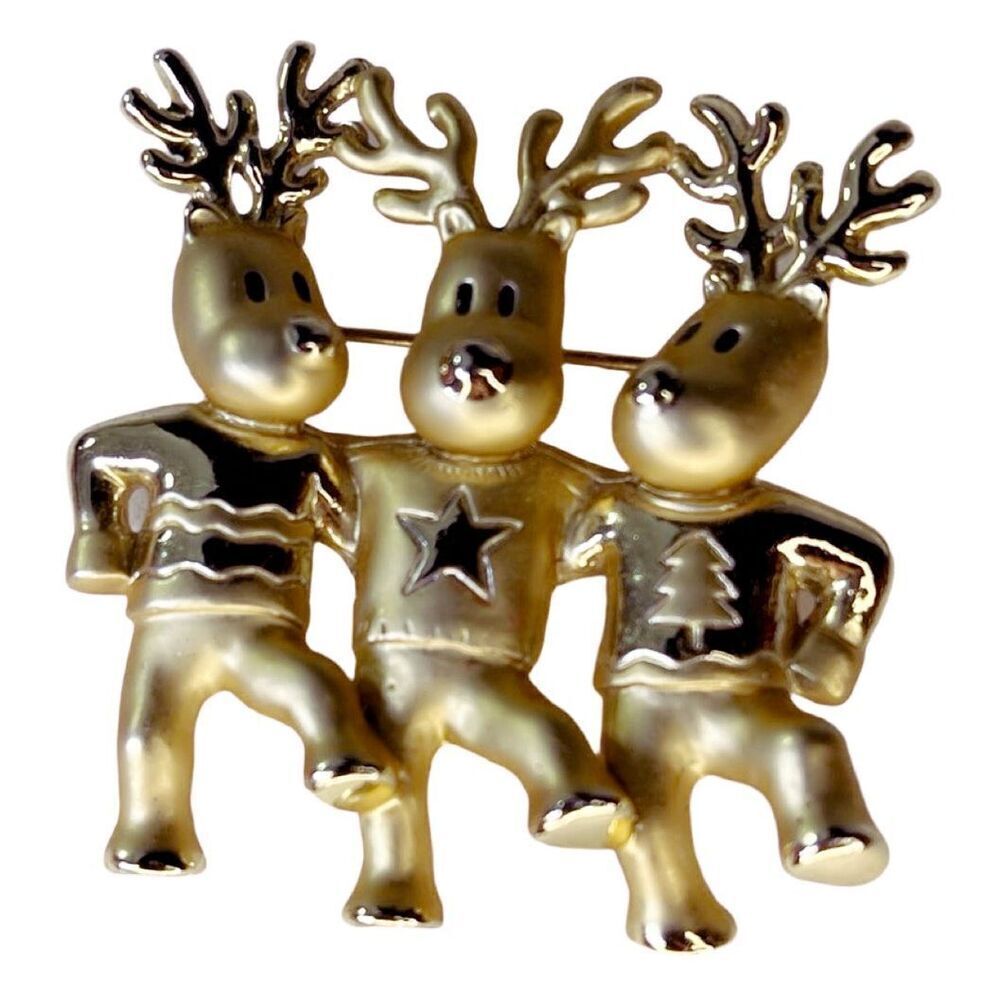 Vintage AJC three dancing deer gold tone brooch.